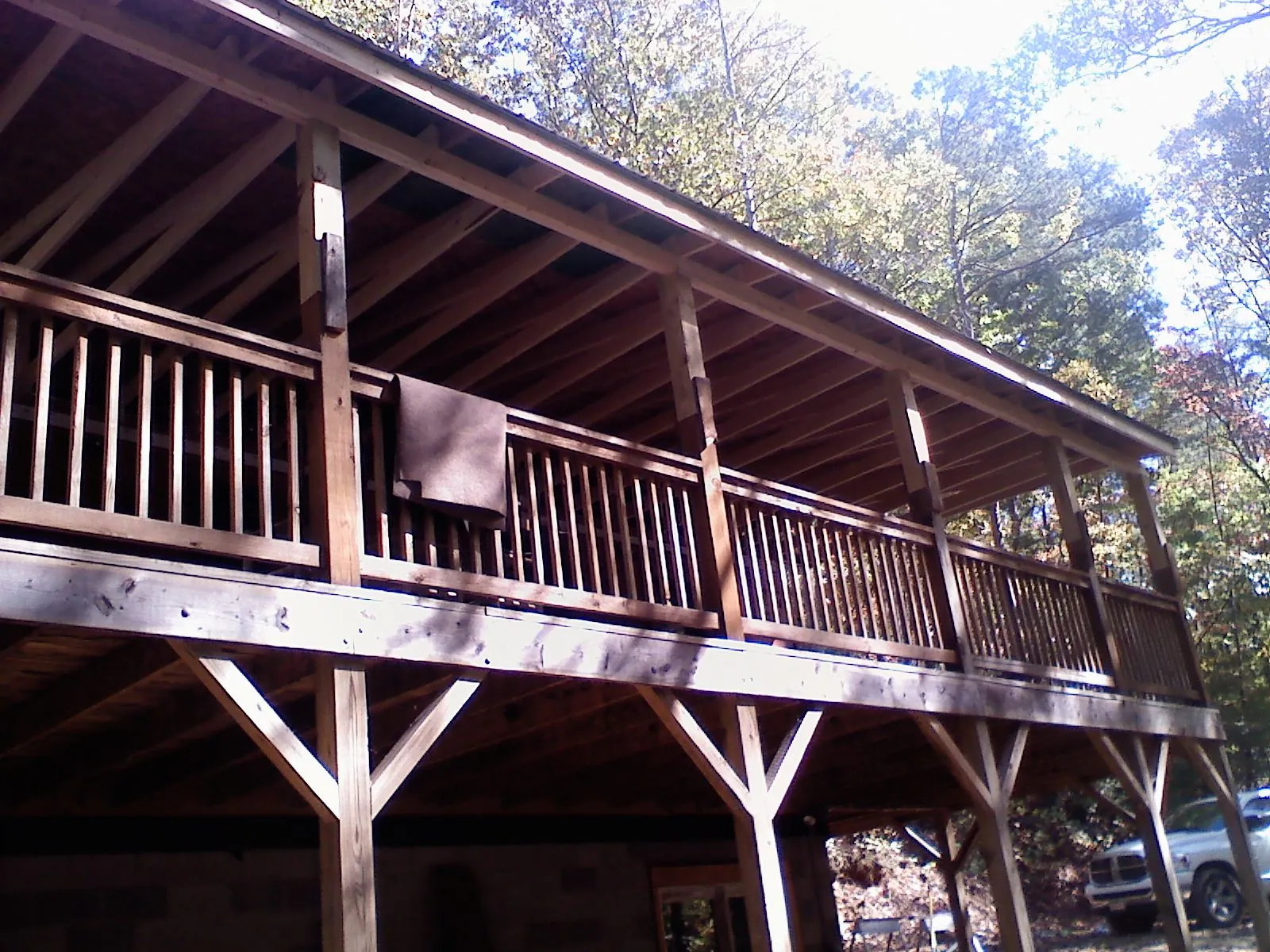 Timber framing under a new elevated porch and deck — Roof Leak Repair in Arnoldsburg by Roofing Brothers